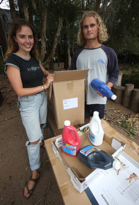 CLIMATE CRUSADERS: University of Wollongong students Claire Rogers and Andy Telfer are backing the strike action. Picture: Robert Peet