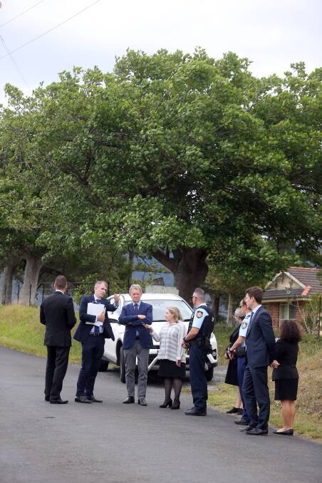 On site: Acting Judge Stephen Walmsley SC (centre) at the crash site in West Dapto where Jayke Robinson died. Pictures: Robert Peet