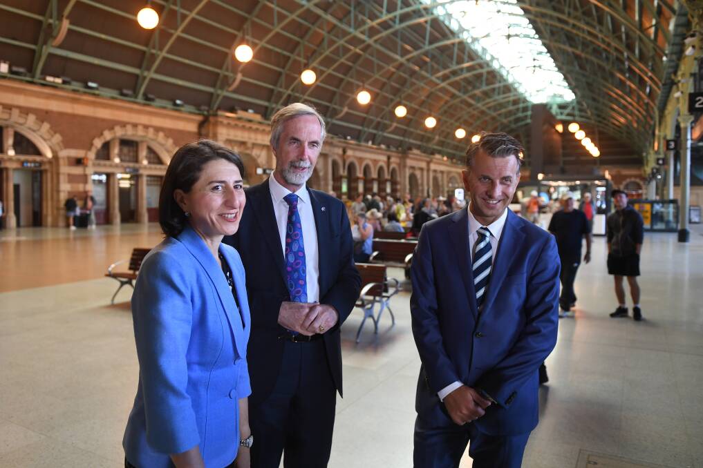 Premier Gladys Berejiklian and Transport Minister Andrew Constance (right) with  Professor Andrew McNaughton, who will assess the investigation into the four faster train routes. Picture: Dean Lewins