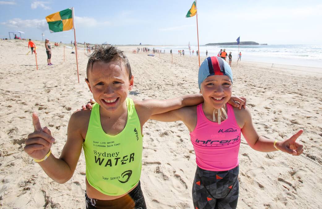 Winners are grinners: Under nine champions James Down and Zara Zammit-Mayer at the Summer Iron Classic. Picture: Adam McLean. 