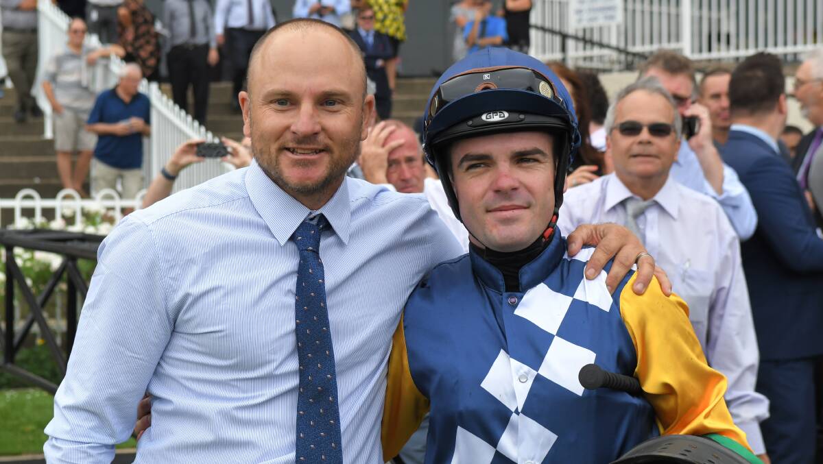 EMOTION CHARHED: Trainer Richard Butler and jockey Shaun Guymer after riding A Snip Of Cindy to victory at Rosehill Gardens. Picture: AAP Image/Simon Bullard