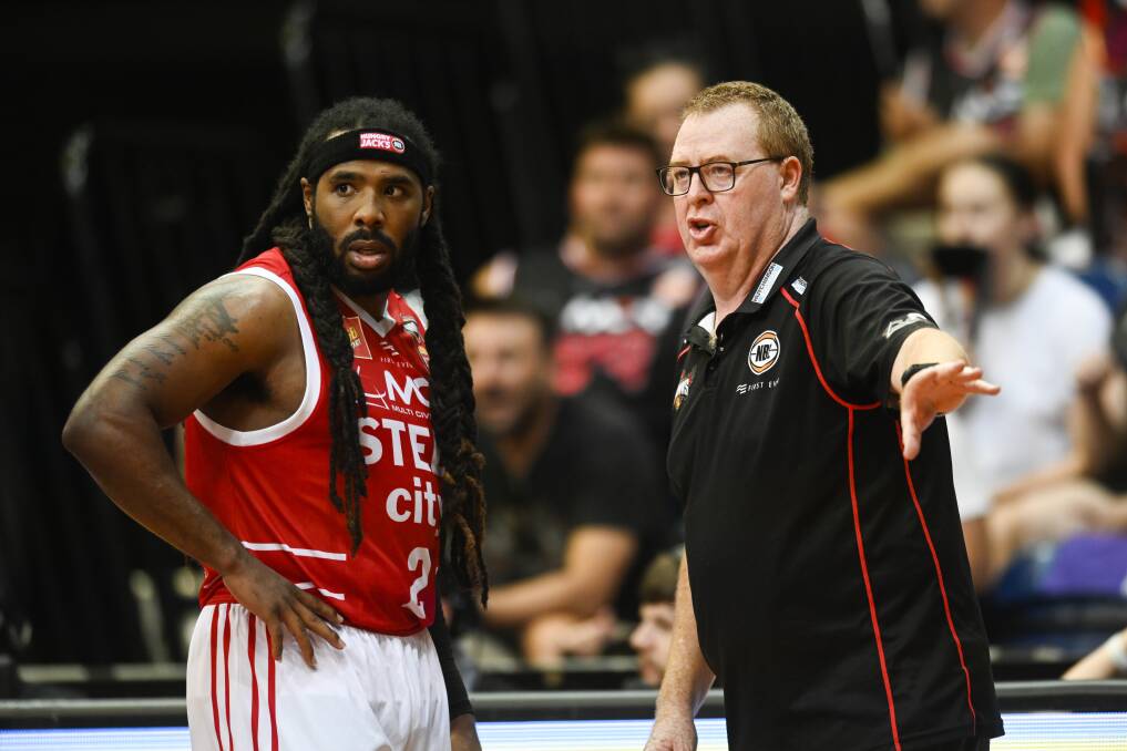 WHEN THE TIME'S RIGHT: "What I can say right now is that I have 100 per cent, hand-on-heart, not made any decision on what I will do beyond our game against New Zealand on Thursday." Hawks coach Rob Beveridge (pictured with Jordair Jett) won't be rushed into a decision on his future. Picture: AAP 