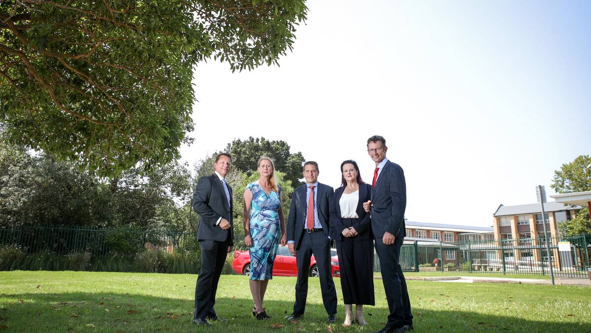 TALKING EDUCATION: Illawarra Labor MPs Paul Scully, Sharon Bird, Ryan Park, Anna Watson and Stephen Jones in front of Wollongong and Keira high schools. Picture: Adam McLean.