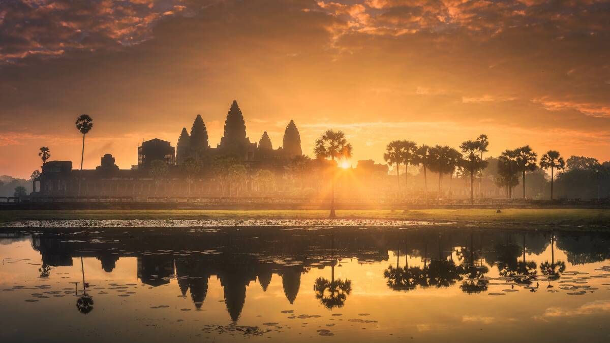 Sunrise view of popular tourist attraction ancient temple complex Angkor Wat with reflected in lake Siem Reap, Cambodia. Picture: Shutterstock
