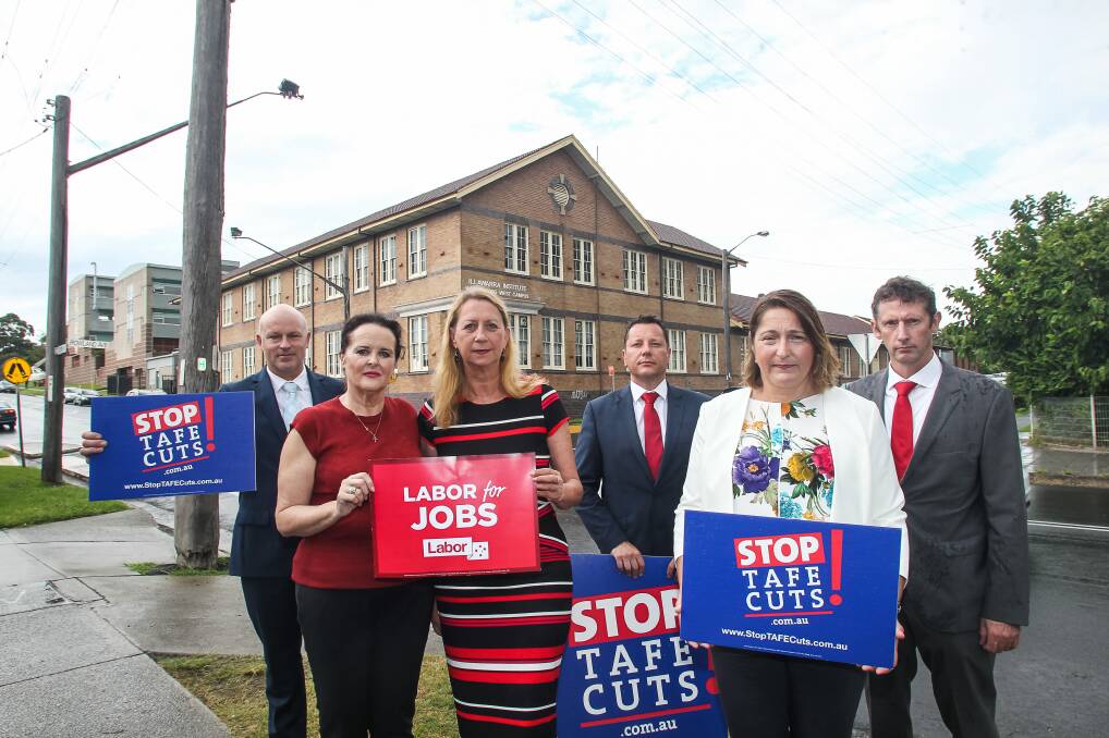 RESTORING TAFE: Illawarra Labor state and federal MPs and candidates Andy Higgins, Anna Watson, Sharon Bird, Paul Scully, Fiona Phillips and Stephen Jones outside West Wollongong TAFE. Picture: Anna Warr