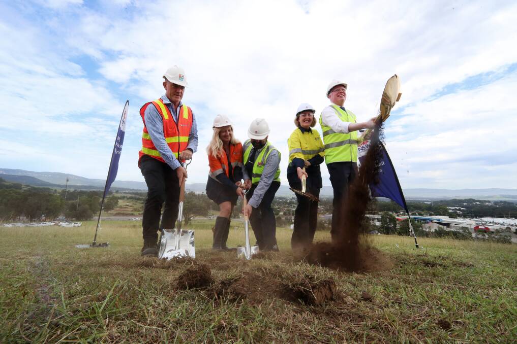 Dig it: Fulton Hogan's Andrew McRae, Shellharbour councillor Kellie Marsh, Tullimbar Community Group's Shane Bitschkat, RMS director Sam Knight and Kiama MP Gareth Ward at the Albion Park Rail sod-turning. Picture: Sylvia Liber