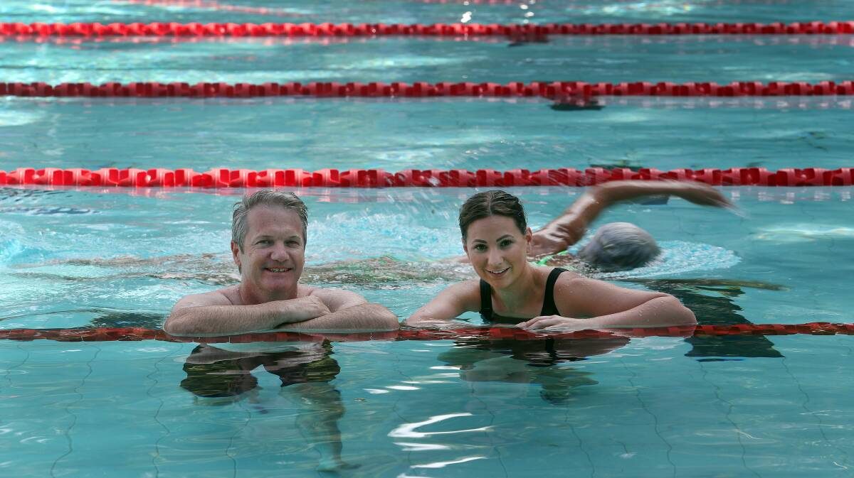 MS MEGA SWIM: AIIM Higher team members Mat Davies and Crystal Mahfouz will compete in the annual 24 hour Wollongong MS Mega Swim at the UOW's UniActive 
 pool on March 16-17. Picture: Robert Peet.