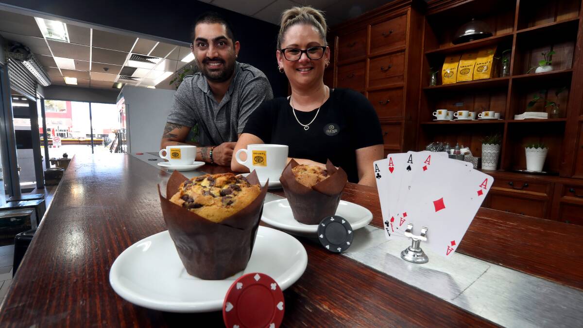 WINNING HANDS: Ra Hira and Bec Potter have opened a poker-themed cafe in Wollongong called Four Aces Cafe. It is opened weekdays from 7am-5pm and weekends from 8am. Picture: Robert Peet.