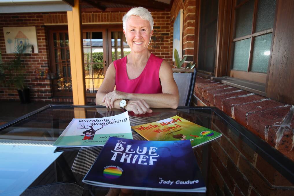DETERMINED: Mount Kembla children's author Jody Cauduro has self published three children's books by her own means, and says you can make a profit if you put in the 'hard slog'. Picture: Adam McLean