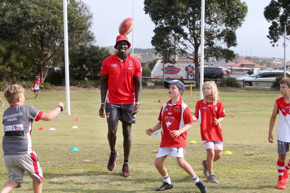 Junior clinic: Aliir Aliir watches on at last week's Sydney Swans community day. Picture: Sylvia Liber.