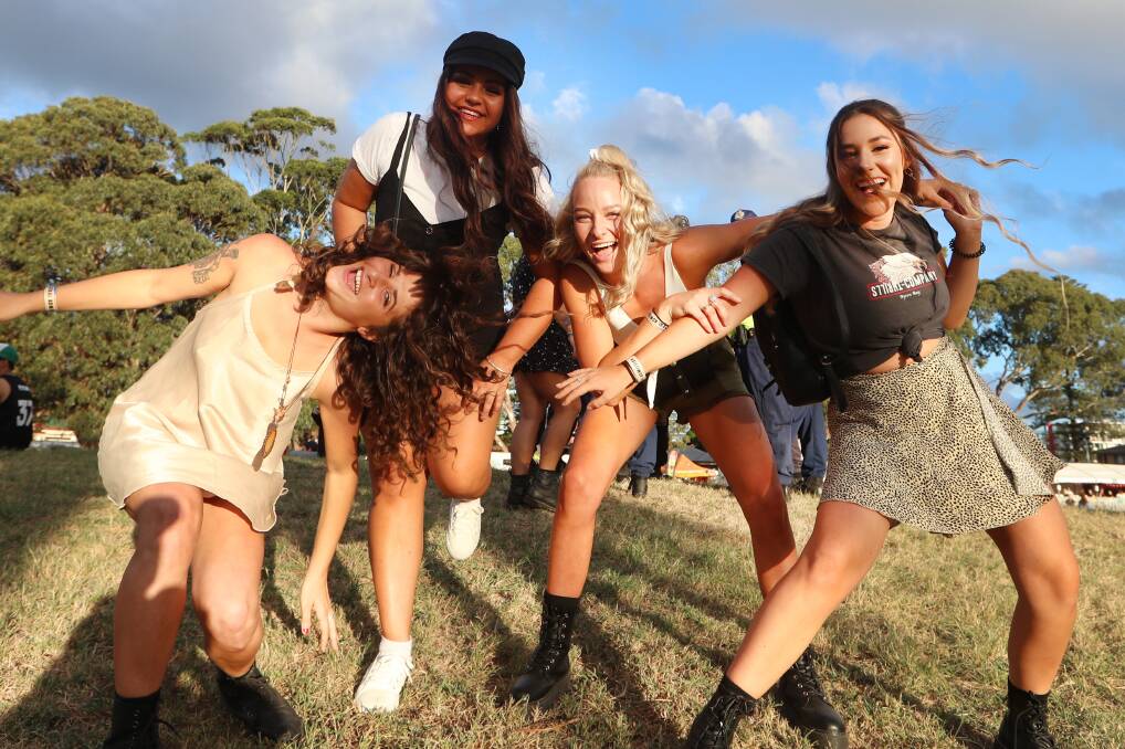 Music fans Teegan Shearing, Isla O'Doherty, Cara Berry and Lynsey Tarrant join thousands to watch Rufus Du Sol at MacCabe Park Wollongong on Friday. Pictures: Sylvia Liber