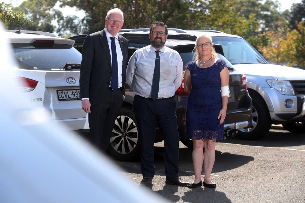 Parliamentary secretary for the Illawarra Gareth Ward, Liberal candidate for Shellharbour Shane Bitschkat and Shellharbour councillor Kellie Marsh. Picture: Robert Peet
