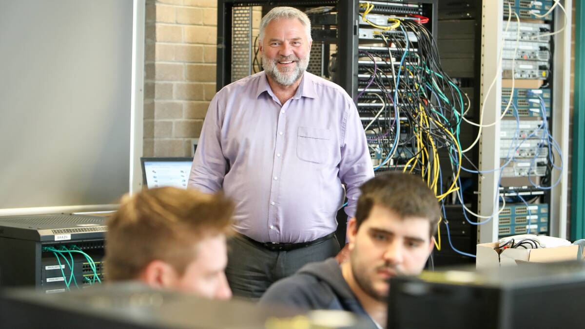 HAPPY MAN: Wollongong West TAFE Information Technology head teacher Terry Kofod. Picture: Adam McLean