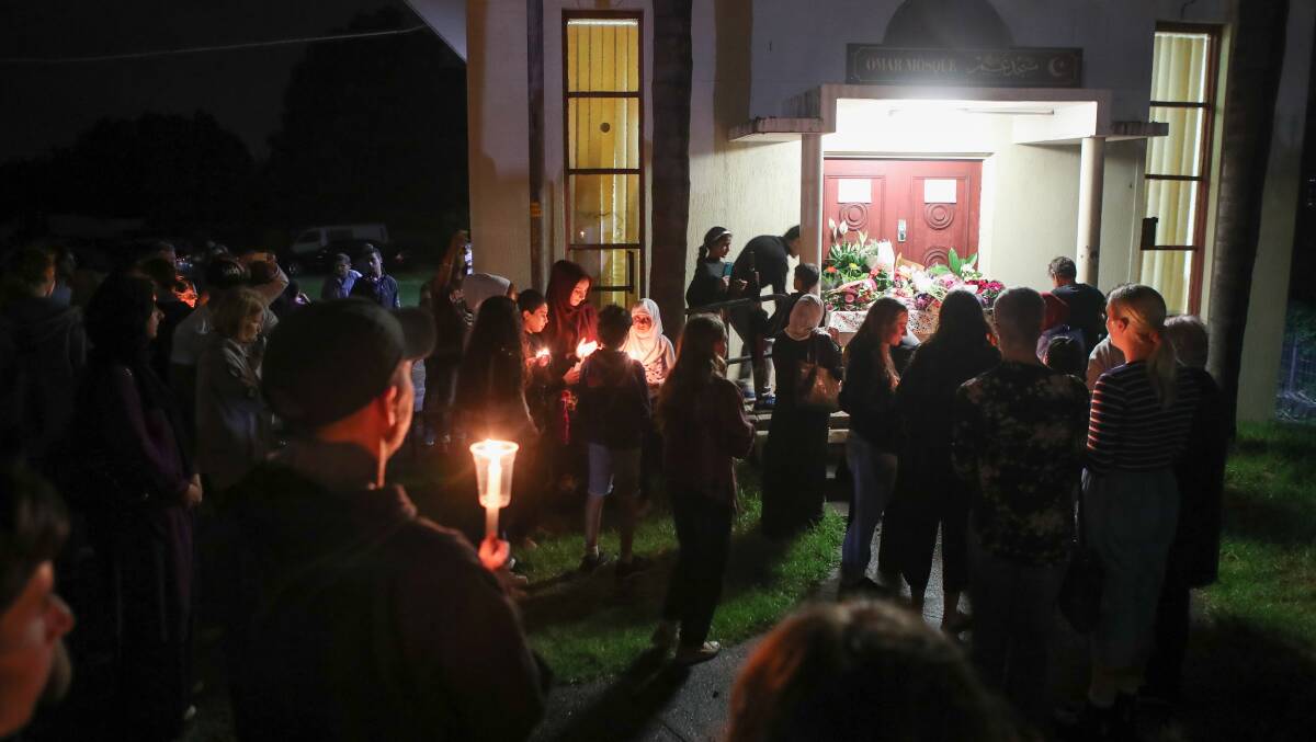 CANDLELIGHT VIGIL: A service and candlelight vigil was held at the Omar Mosque in Gwynneville in the wake of the New Zealand terrorist attack that saw 50 people gunned down at two mosques. Picture: Adam McLean