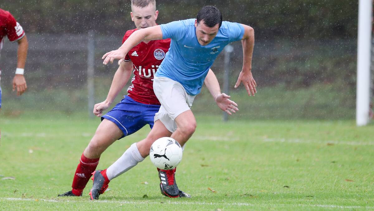 COACHING CHANGE: Corrimal's Tim Wylie holds possession in the Rangers' Fraternity Club Cup Final win. Photo: Adam McLean. 