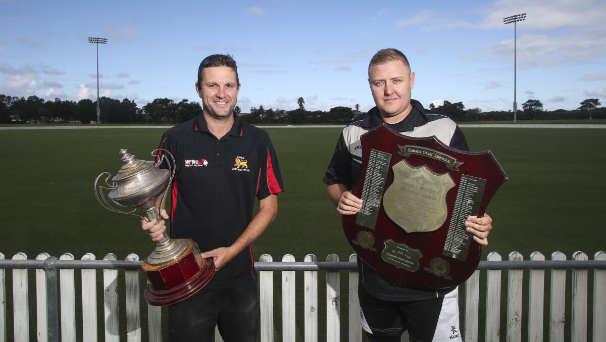 Playing for keeps: Keira captain Kyle Connor and Balgownie's Jamie Fleming with the Cricket Illawarra trophies. Picture: Anna Warr. 