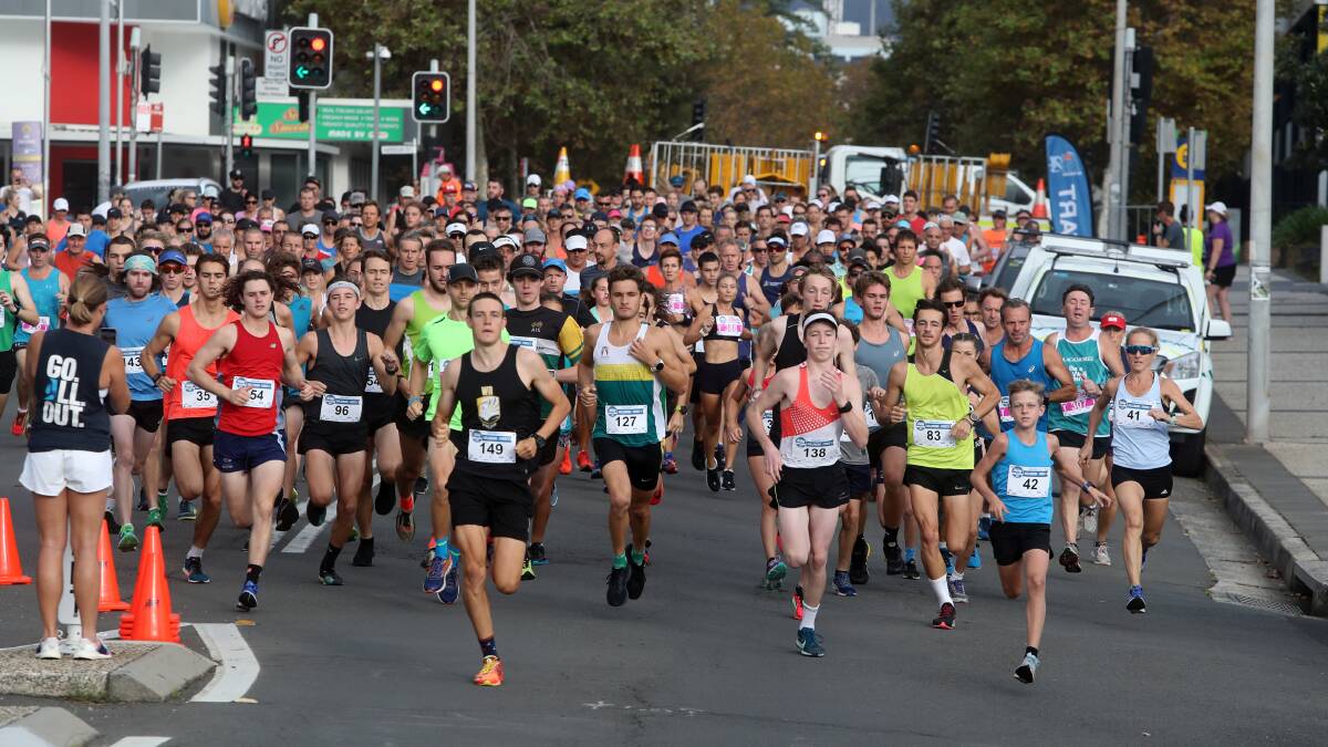Off and racing: Runners set off along the harbour foreshore in the 2019 Fitness 5 and Kerryn McCann 10. Picture: Robert Peet