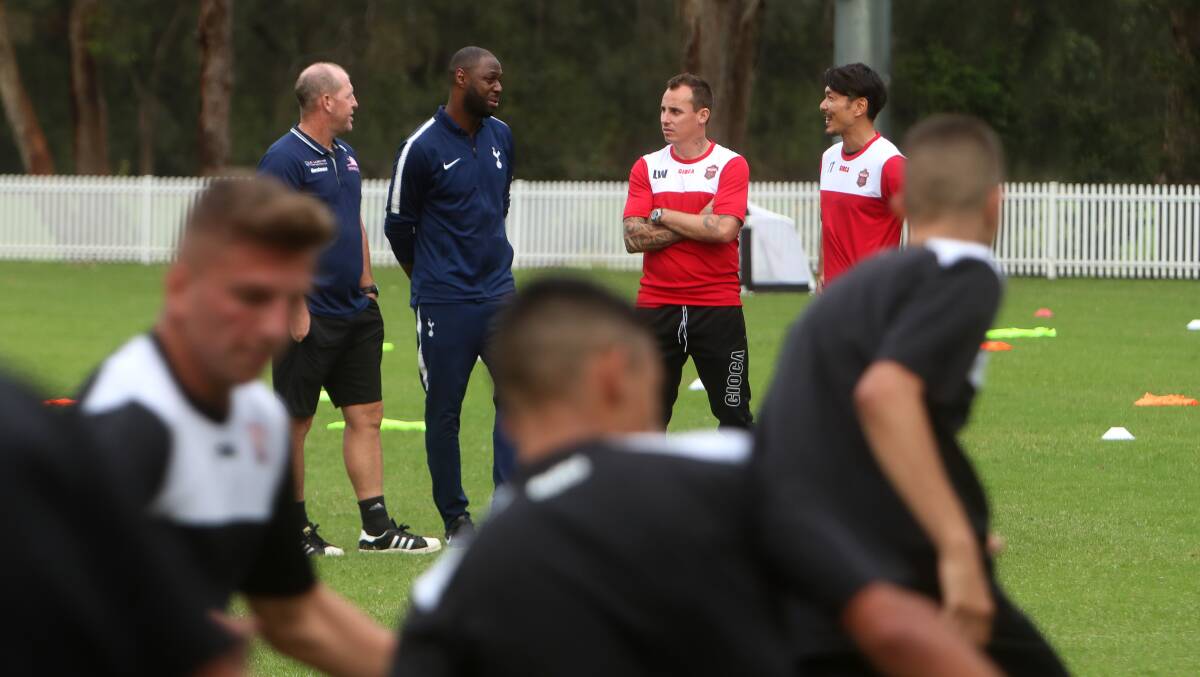 Spurred on: Scott Chipperfield, former Tottenham defender Ledley King, Luke Wilkshire and Yuzo Tashiro at University of Wollongong in March. Picture: Sylvia Liber