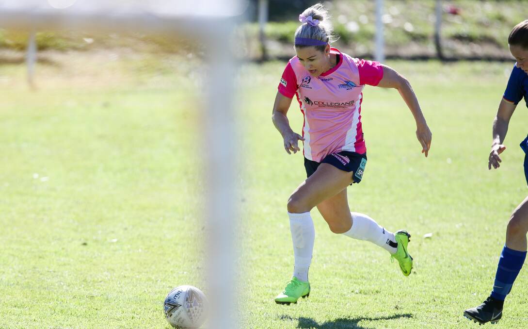 IMPORTANT ROLE: Stingrays attacker Erica Holloway charges towards goal at JJ Kelly Park. Photo: Adam McLean. 