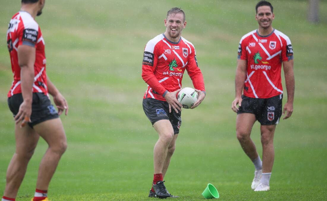 Comfortable: Matt Dufty training in the rain with Corey Norman on Thursday. Picture: Adam McLean. 