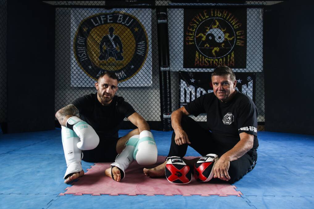 TIME HAS COME: Alex Volkanovski and coach Joe Lopez at Windang's Freestyle Fighting Gym. Picture: Anna Warr