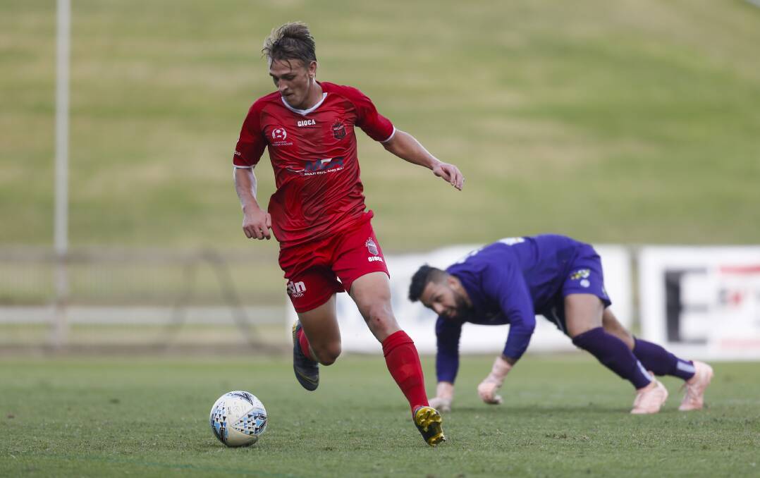 Strike: Lachlan Scott scored twice for Wollongong against Manly on Sunday. Picture: Anna Warr