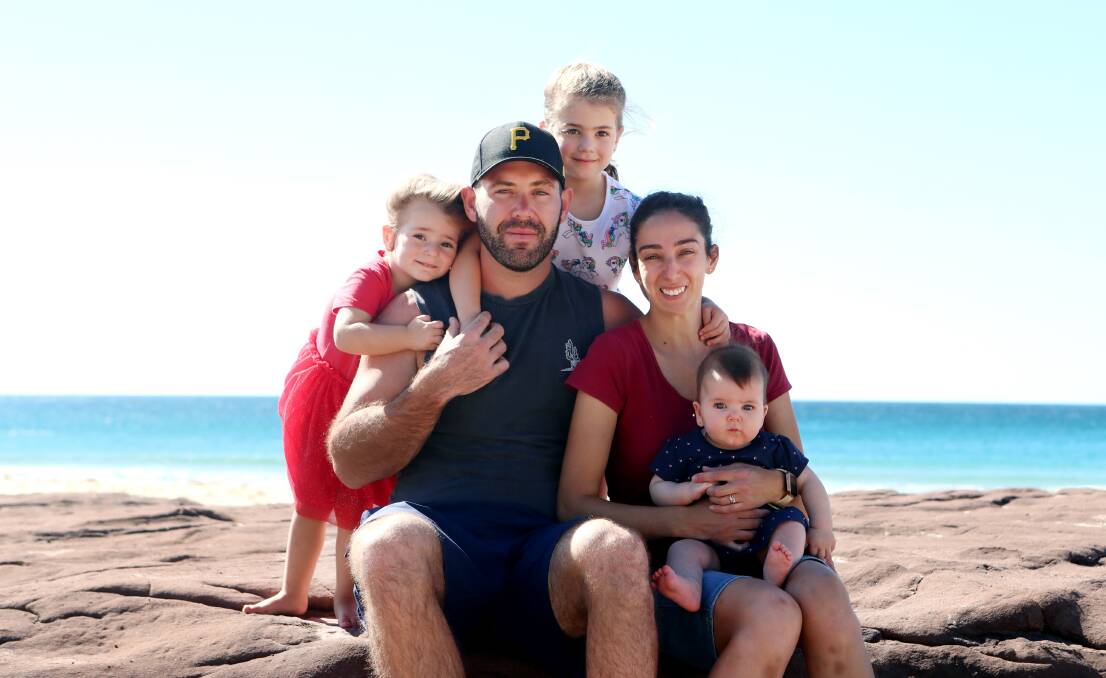 Raising awareness: Melissa Dorans with husband Jared and daughters Amelia, 2; Selina, 4 and Olivia, six months. Mrs Dorans has organised the first Wollongong SCADaddle fundraiser next weekend. Picture: Sylvia Liber