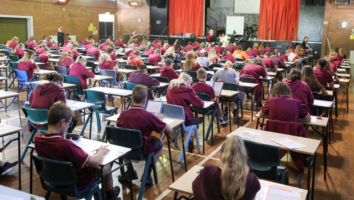 OLD SCHOOL: Year 7 Dapto High School students doing their NAPLAN test with pen and paper earlier this year. Picture: Adam McLean