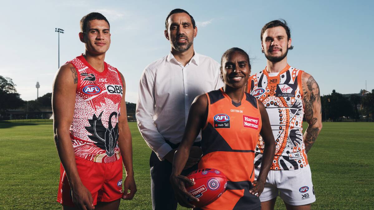 Talent: Shellharbour's James Bell (left) with Swans great Adam Goodes. Picture: James Brickwood