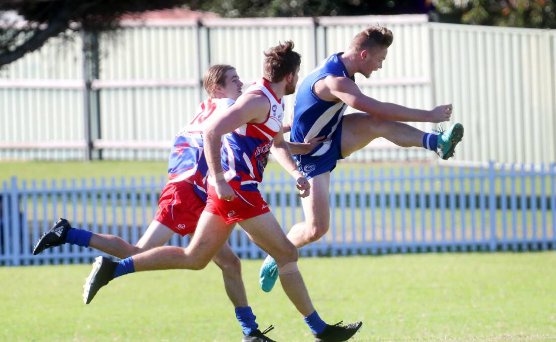 MERCURY. NEWS.Wollongong Bulldogs (blue/white/red) v Figtree (blue/white). pic of Figtree no 17 Callum McFadden . Picture: Sylvia Liber. 25 May 2019