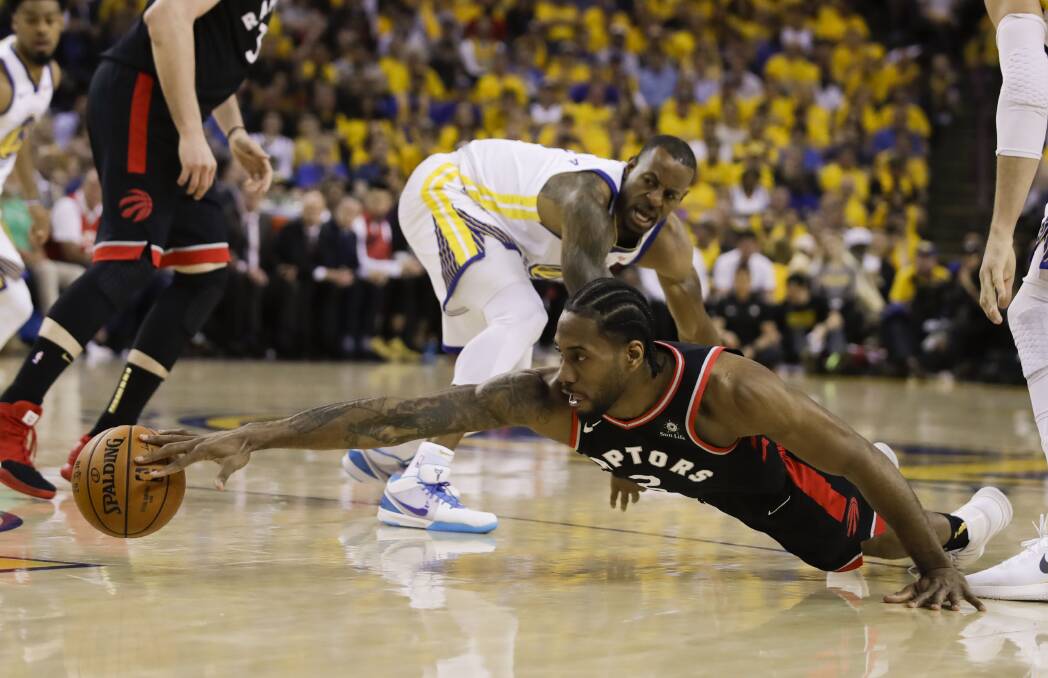 BOARD MAN: Kawhi Leonard (floor) led Toronto to victory but the NBA show is arguably even hotter in the off-season.