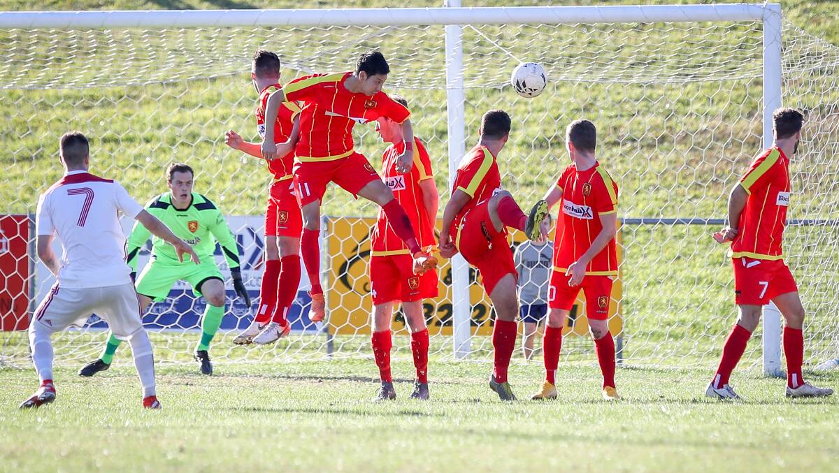 Net gains: Cameron Morgan buries a free kick against Wollongong United on Saturday. Picture: Adam McLean
