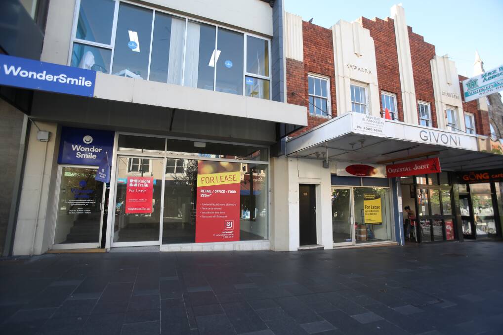 There are many For Lease signs in the Crown Street Mall, though one expert says a rent reduction could be the solution. Picture: Robert Peet