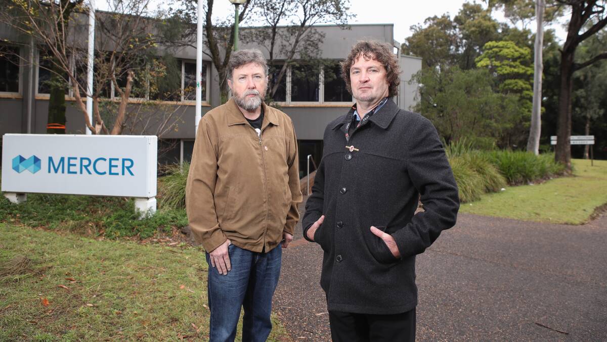 UNCERTAINTY: CPSU Illawarra organisers Shane Elliott and Bart McKenzie pictured in 2019 outside Mercer Administration in Coniston. Mr McKenzie fears job losses after the company's head office lost a major client. Picture: Adam McLean