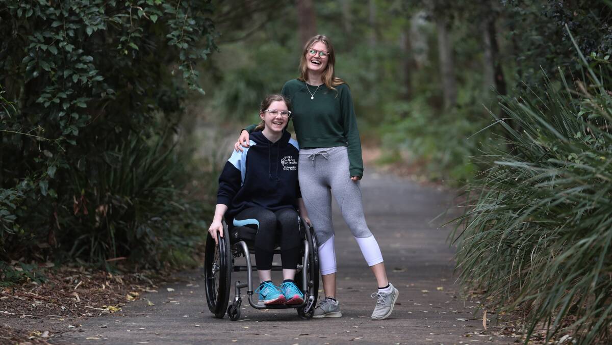 Breaking barriers: Macy Torrington lives with a chronic illness but, with the help of friend Emma De Costa, she's taking on the challenge of the City2Surf. Picture: Robert Peet