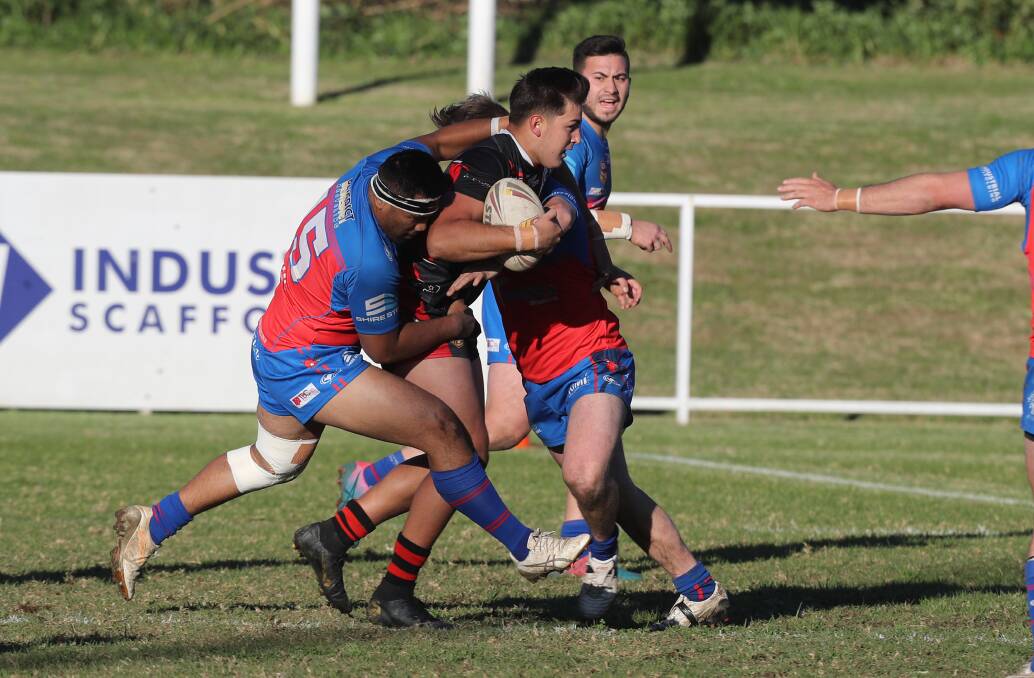 ON THE FLY: Collegians winger Jiye Ellis takes on the Devils defence on Saturday. Picture: Robert Peet