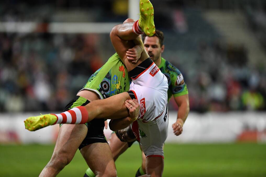 Driven: Nick Cotric tackles Tim Lafai. Picture: Robb Cox/NRL Photos
