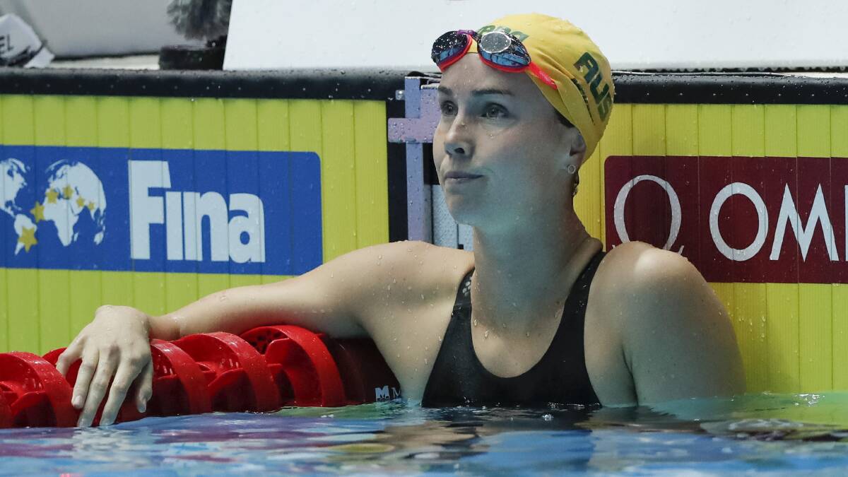 Australia's Emma McKeon reacts after her women's 100m butterfly semifinal at the World Swimming Championships in Gwangju, South Korea, Sunday, July 21, 2019. (AP Photo/Lee Jin-man)