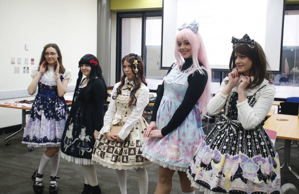 JAPANESE STREET STYLE: Lolita fashion fans Kate Ireland, Sami Bell, Gabryel Katte, Emily Coleman and Brit Alcock in Wollongong on Saturday. Picture: Anna Warr