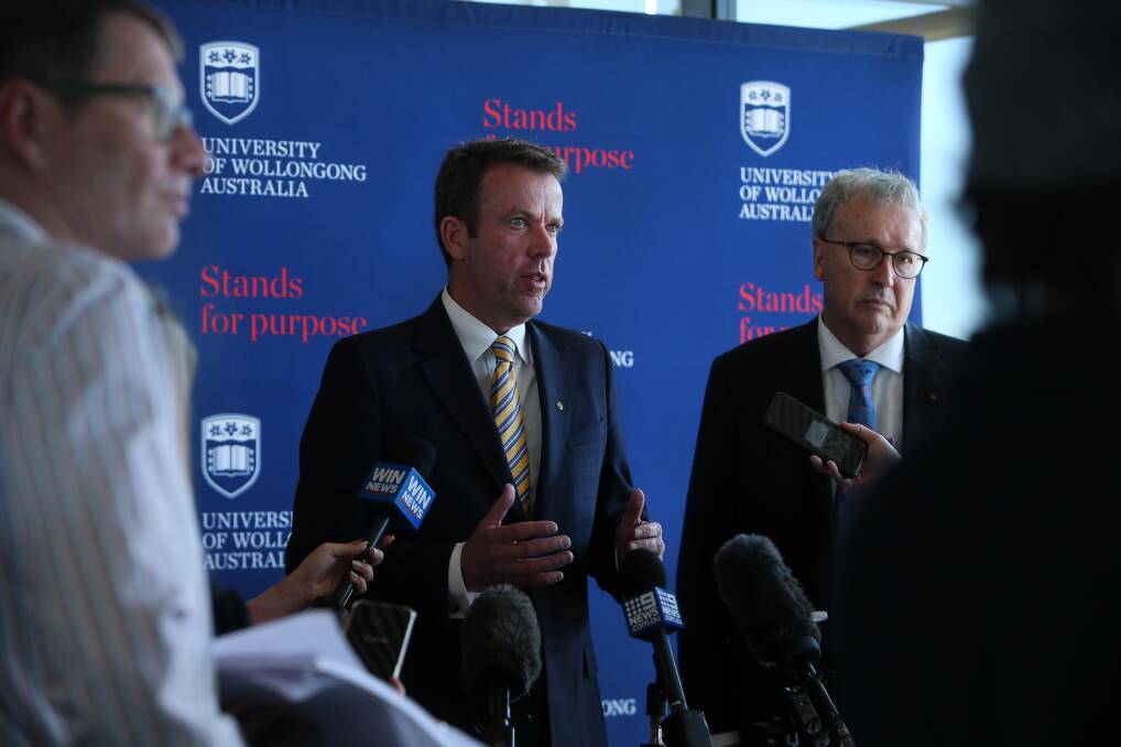 SELLING A VISION: Federal Education Minister Dan Tehan and UOW Vice Chancellor Paul Wellings talking about the performance-based funding scheme. Picture: Sylvia Liber