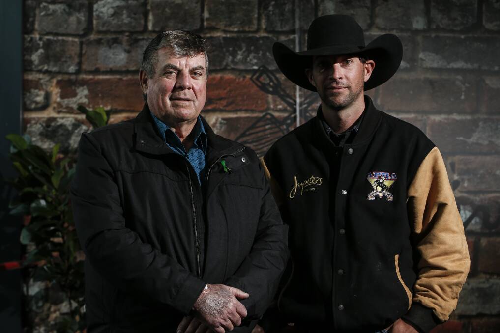 Rodeo 4 Life promoter Doug Vickers with champion bull rider Troy Cross in Wollongong on Thursday. The Illawarra will host the inaugural event with the plan to hold more in the future. Picture: Anna Warr