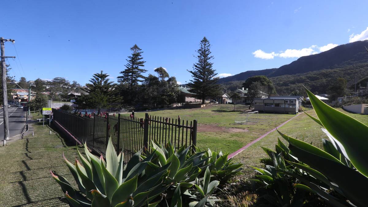 The lower grass playground at Austinmer Public School was closed to students last week because of safety reasons. Picture: Robert Peet