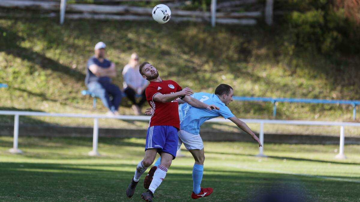 Heads up: Albion Park's Chris Nathaniel and Corrimal player Jaso Zufic are up for the challenge. Picture: Robert Peet