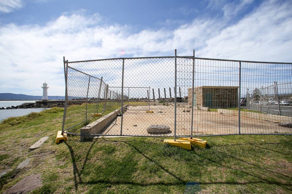 Start date: Work to remediate contaminated land fenced in at Belmore Basin for years will start later this year. MP Paul Scully is concerned it will still be going during the summer months. Picture: Adam McLean.