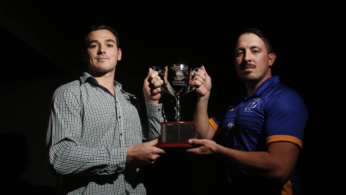Grand final combatants: Shamrocks' Damien Clark (left) and Avondale's Andy Duggan with the Illawarra Rugby trophy. Picture: Anna Warr.