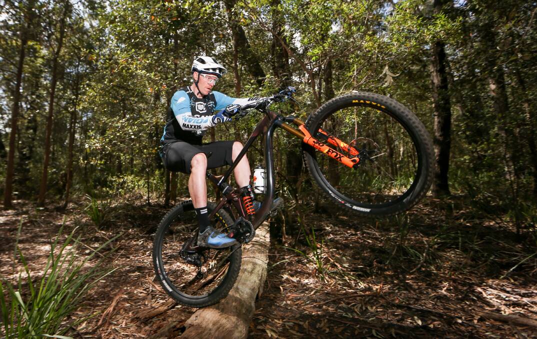 SLOW BERM: Professional mountain bike rider Josh Carlson is one of those advocating for a network of legal trails on Mt Keira. Picture: Adam McLean.