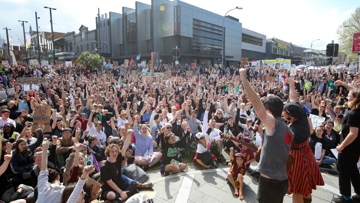 Thousands of protesters sitting at the intersection of Kembla and Crown streets, Wollongong during the last School Strike 4 Climate global rally on September 20, 2019. Picture: Adam McLean.