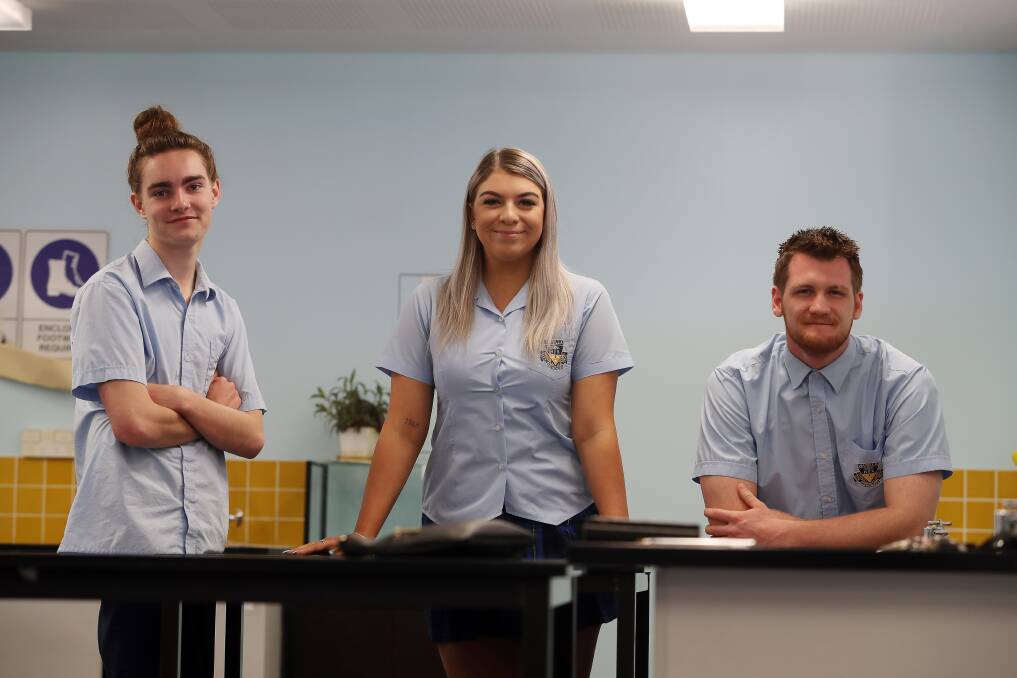POSITIVE EXPERIENCE: Warilla High School students Matthew Erlik, Kate Cudina and Nicholas Twigg have enjoyed doing the HSC Science Extension course. Picture: Robert Peet