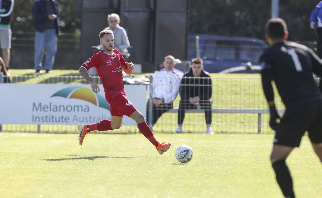 Final charge: Wollongong Wolves striker Thomas James scored in the 2-nil win over Perth to qualify for the NPL series final. Picture: Anna Warr