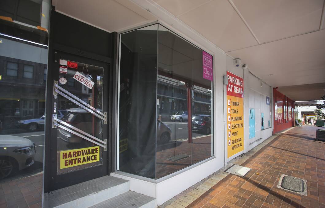 THAT'S ALL FOLKS: Front shop window of the Bulli store. Picture: Anna Warr.